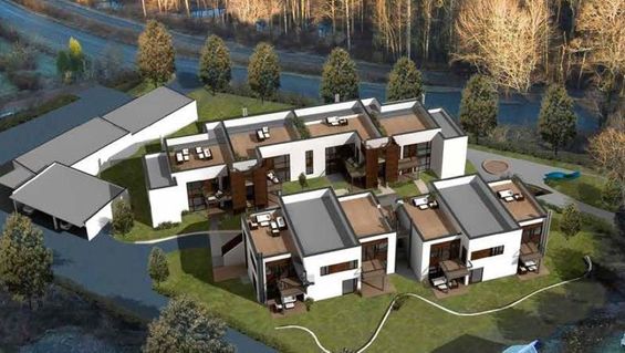 Oversiktsbilde av område med skisser av nye boliger